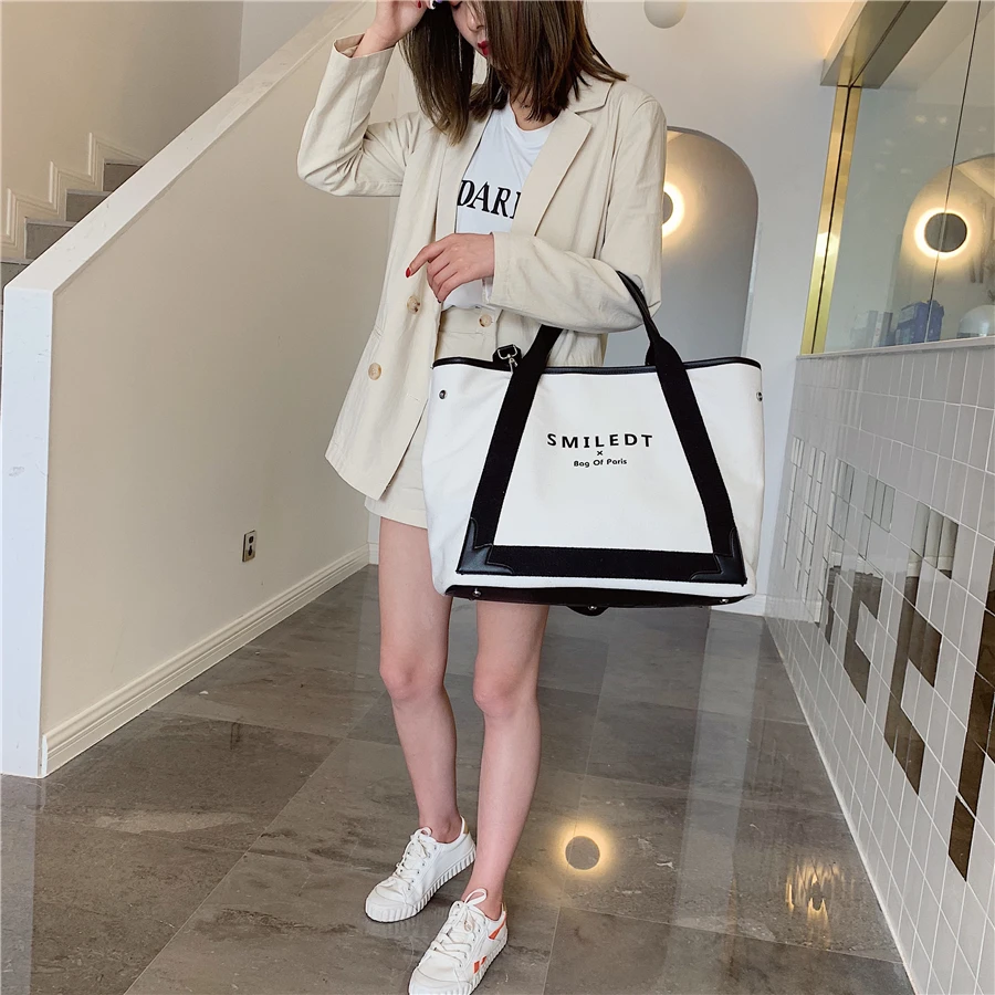 New trendy fashion messenger bag simple canvas autumn and winter large capacity shoulder bag portable tote bag
New trendy fashion messenger bag simple canvas autumn and winter large capacity shoulder bag portable tote bag
