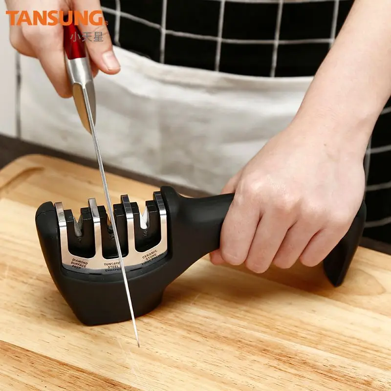 Three-in-one sharpening sharpener artifact sharpener new kitchen handheld sharpener kitchen gadget
Three-in-one sharpening sharpener artifact sharpener new kitchen handheld sharpener kitchen gadget
