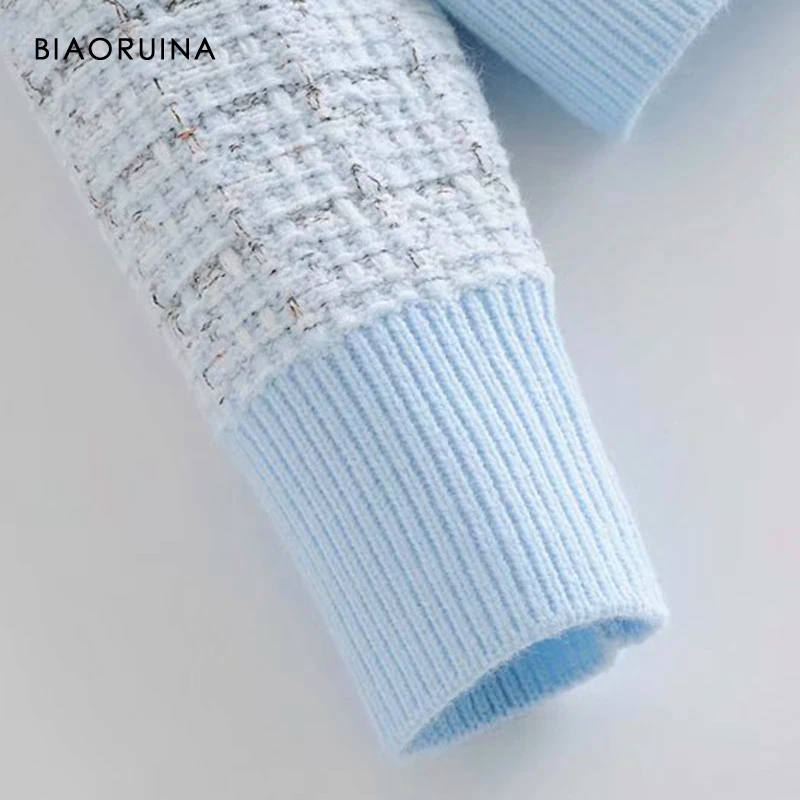 BIAORUINA Women's Light Blue Tweed Single Breasted V-neck Knitted Cardigan Female Elegant Loose Autumn Sweater New Arrival 
BIAORUINA Women's Light Blue Tweed Single Breasted V-neck Knitted Cardigan Female Elegant Loose Autumn Sweater New Arrival