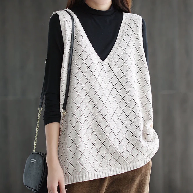 Женский трикотажный жилет с V-образным вырезом, без рукавов
Женский трикотажный жилет с V-образным вырезом, без рукавов