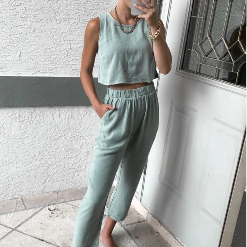 Summer Casual Two Pieces Tracksuit Women's Set Solid Sleeveless Blouses And Wide Leg Pants Female Sets 2021 Fashion Ladies Suits
Summer Casual Two Pieces Tracksuit Women's Set Solid Sleeveless Blouses And Wide Leg Pants Female Sets 2021 Fashion Ladies Suits