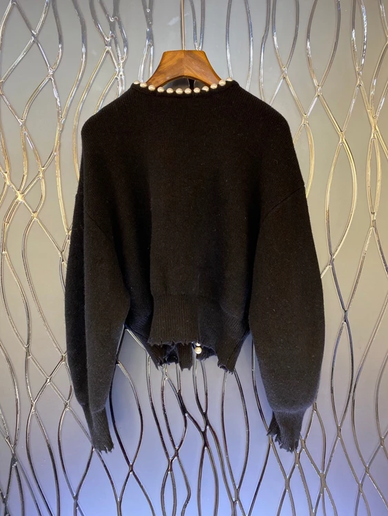 2020 autumn and winter new women's solid color decorative round neck heavy beaded knitted sweater 1210
2020 autumn and winter new women's solid color decorative round neck heavy beaded knitted sweater 1210