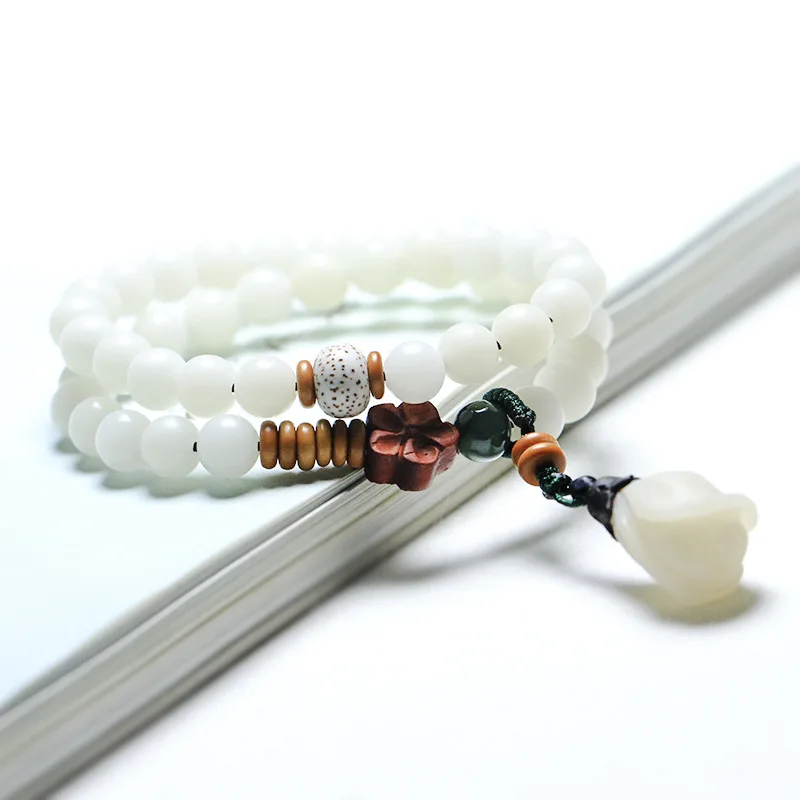 New trend fashion art small fresh bodhi bracelet carved lily flower pendant high quality exquisite customized gift for girl 
New trend fashion art small fresh bodhi bracelet carved lily flower pendant high quality exquisite customized gift for girl