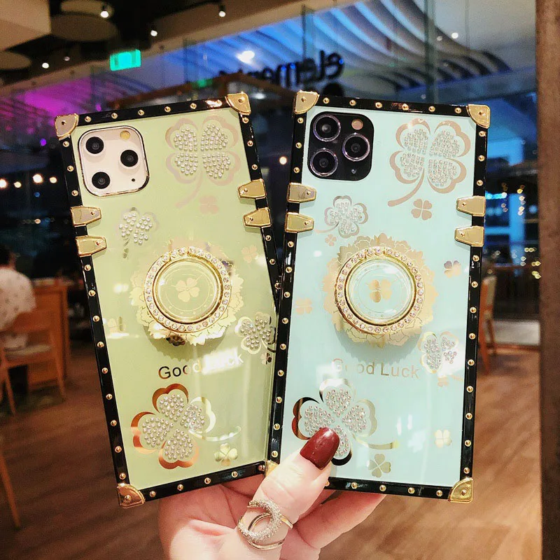 Роскошный чехол для телефона с кольцом и цветами на удачу для IPhone 11 XR SE 2020 6 7 8 Plus XS MAX 12 Pro Max, квадратный мягкий чехол с бриллиантами, чехлы
Роскошный чехол для телефона с кольцом и цветами на удачу для IPhone 11 XR SE 2020 6 7 8 Plus XS MAX 12 Pro Max, квадратный мягкий чехол с бриллиантами, чехлы