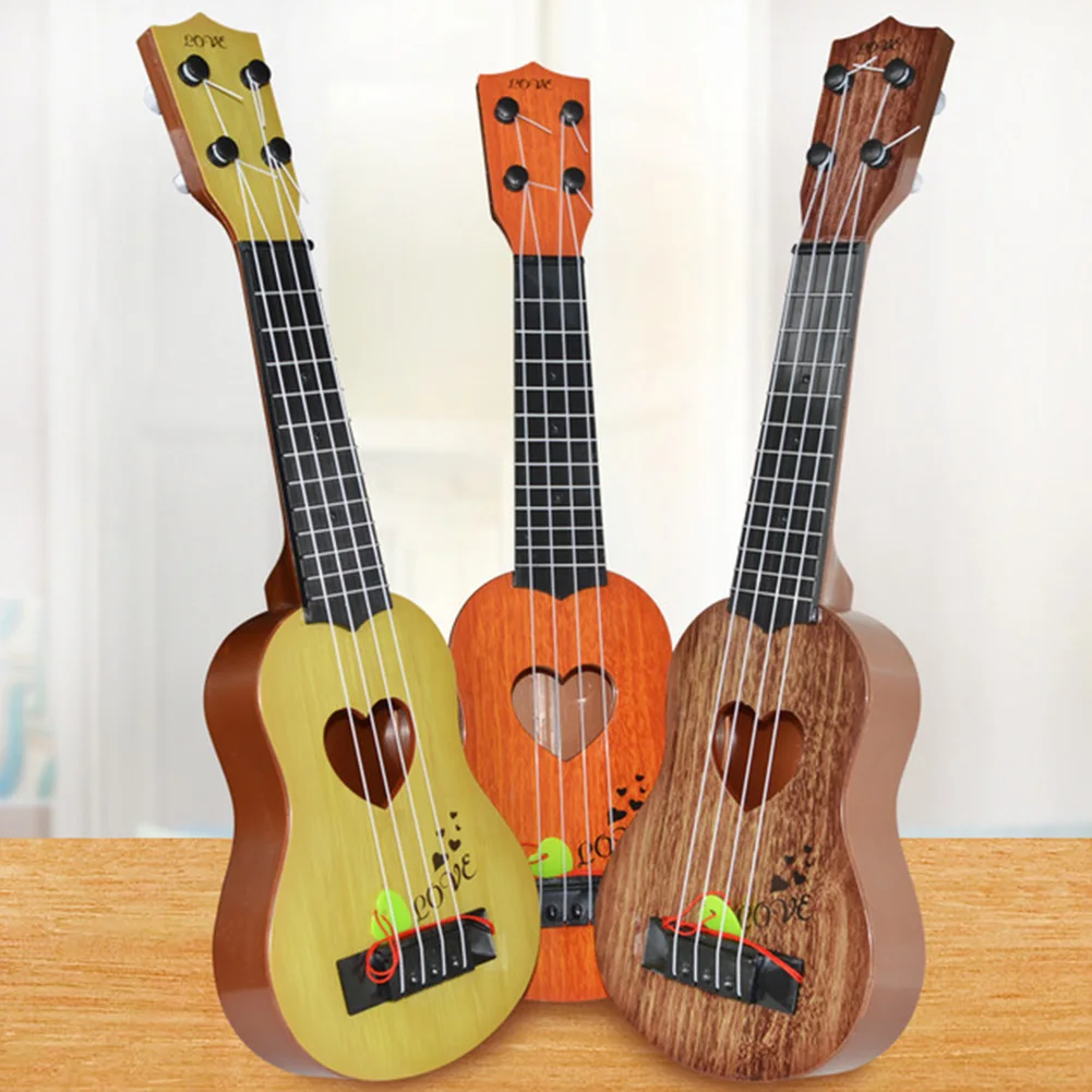 Ukulele Children's Music Small Guitar Environmental ABS High Simulation Ultralight Musical Instrument Kids Gift Toys
Ukulele Children's Music Small Guitar Environmental ABS High Simulation Ultralight Musical Instrument Kids Gift Toys