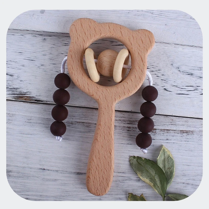 Baby Beech Teether Bell Rattle Toddler Teething Nursing Toy Shower Gifts Silicone Beads Soother Molar 
Baby Beech Teether Bell Rattle Toddler Teething Nursing Toy Shower Gifts Silicone Beads Soother Molar