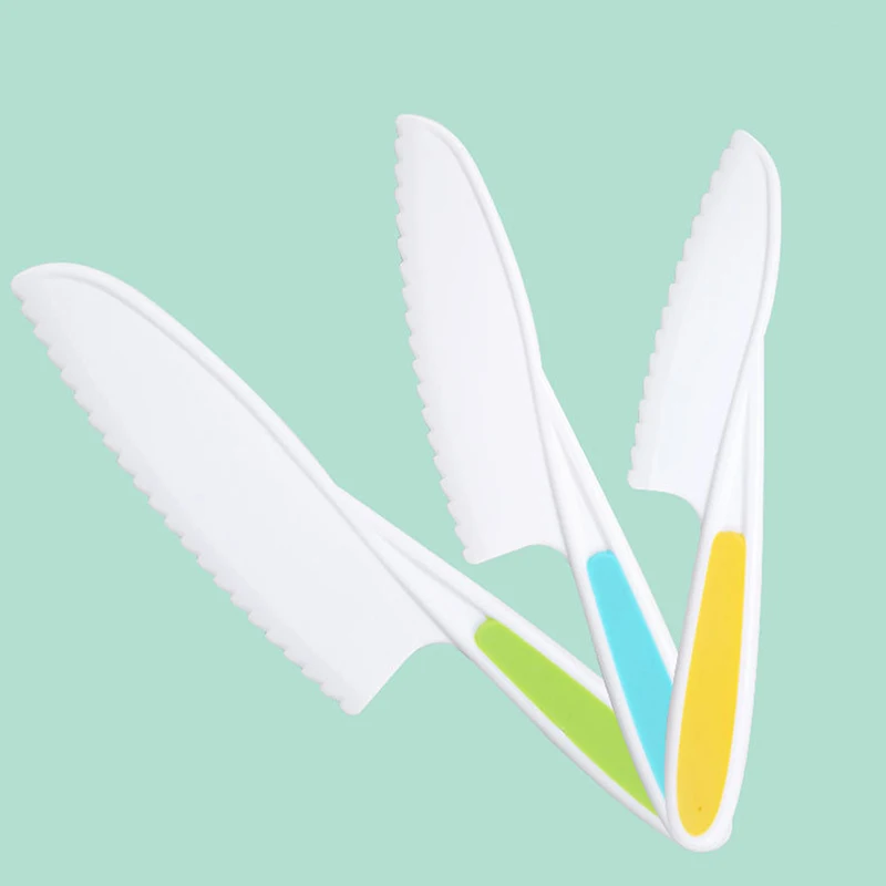 Kids Safety Sawtooth Cutter Plastic Paring Fruit Knife Childrens Chef for Bread Lettuce Toddler Cooking Knives Children DIY Tool
Kids Safety Sawtooth Cutter Plastic Paring Fruit Knife Childrens Chef for Bread Lettuce Toddler Cooking Knives Children DIY Tool