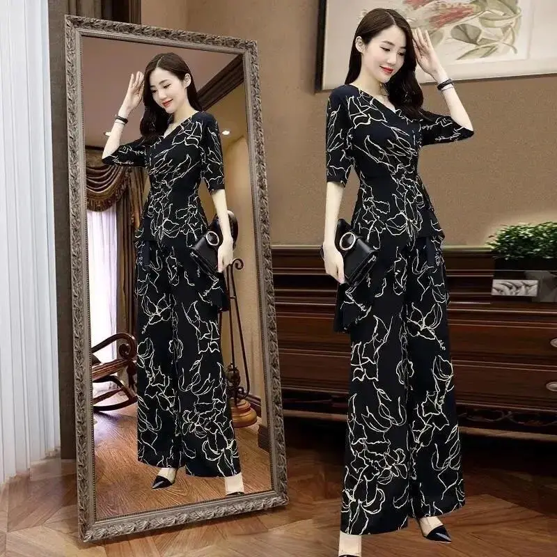 Suit women's summer New Fashion Chiffon shirt loose cover belly Wide Leg Pants Large size two piece suit
Suit women's summer New Fashion Chiffon shirt loose cover belly Wide Leg Pants Large size two piece suit