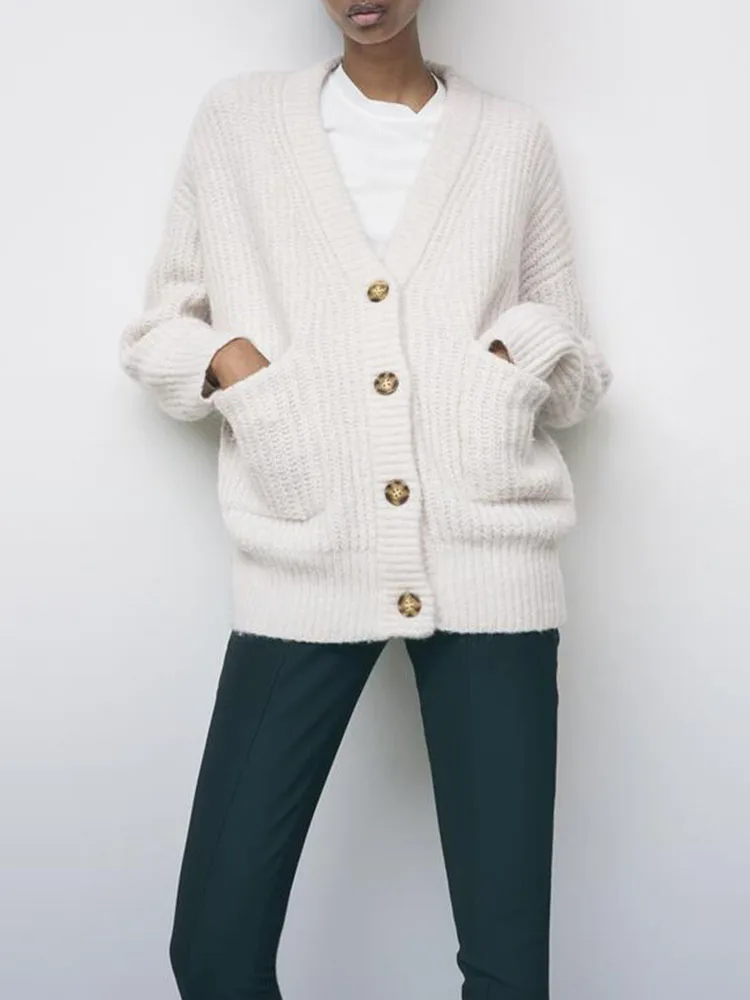 lazy style knitted cardigan early autumn new sweet temperament literary V-neck loose pocket knitted jacket
lazy style knitted cardigan early autumn new sweet temperament literary V-neck loose pocket knitted jacket
