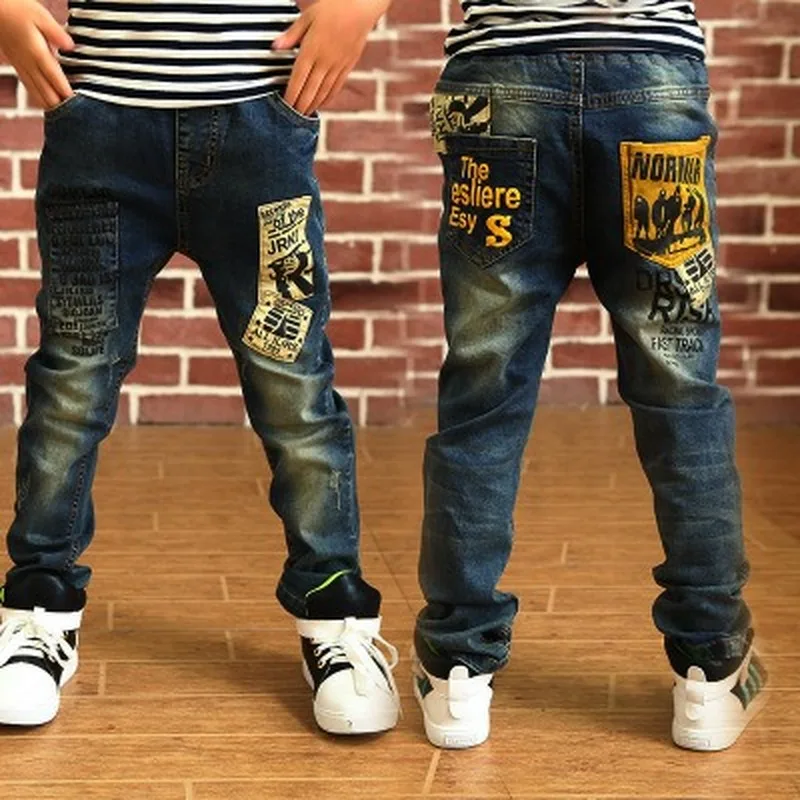 

Новинка 2020, детские джинсовые брюки на весну и осень, модные джинсы в стиле хип-хоп для мальчиков, джинсы с мультяшными дырками для мальчиков...