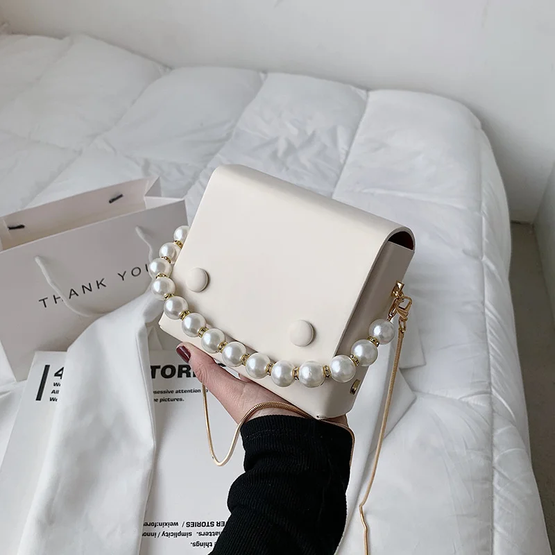 Luxury Pearl Chain Strap Design Mini Women Crossbody Bags 2021 Fashion Simple Pu Leather Shoulder Bag Women's Designer Handbags
Luxury Pearl Chain Strap Design Mini Women Crossbody Bags 2021 Fashion Simple Pu Leather Shoulder Bag Women's Designer Handbags