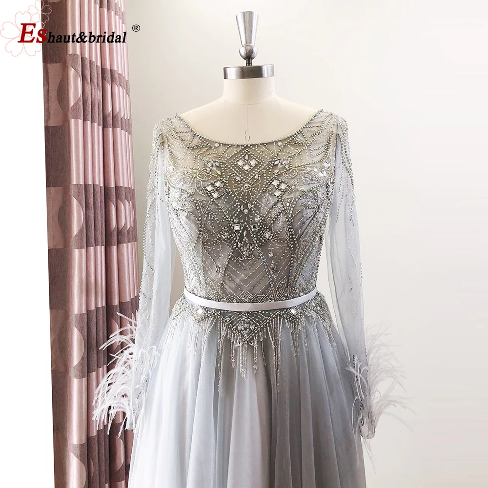 Luxury Beads Evening Dress 2020 Long Sleeves with Feather A Line O Neck Elegant Tulle Dubai Formal Prom Party Gowns
Luxury Beads Evening Dress 2020 Long Sleeves with Feather A Line O Neck Elegant Tulle Dubai Formal Prom Party Gowns