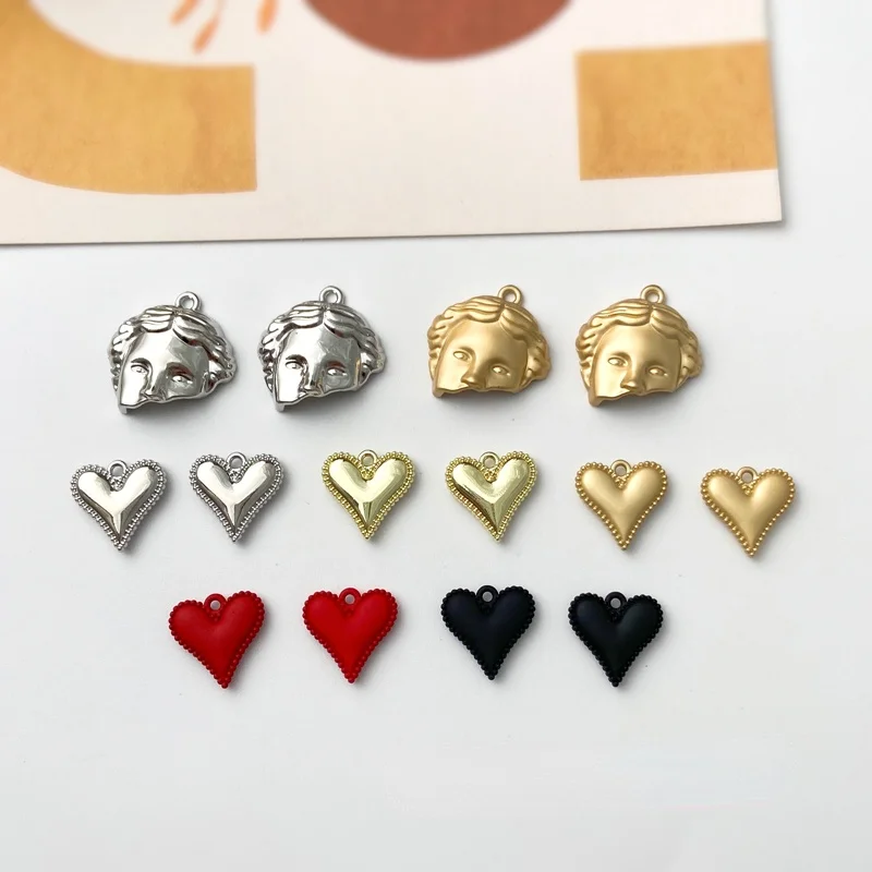 Retro jewelry material art half face pendant love heart pendant diy earrings handmade necklace accessories
Retro jewelry material art half face pendant love heart pendant diy earrings handmade necklace accessories