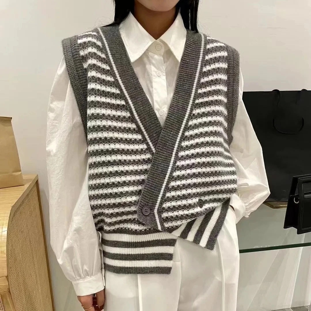 Sweater female stripe V-neck loose vest cardigan sweater women striped sleeveless vest P3 568
Sweater female stripe V-neck loose vest cardigan sweater women striped sleeveless vest P3 568