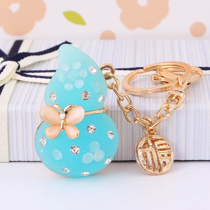 Factory direct supply gourd shape key chain metal bell key chain custom make keychain
Factory direct supply gourd shape key chain metal bell key chain custom make keychain