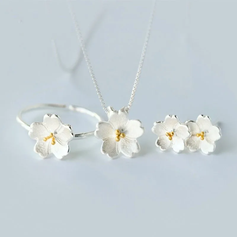 New Fashion 925 Silver Cherry Blossom Jewelry Set Simple Peach Blossom Stud Earrings Necklace Adjustable Ring Bracelet for Women
New Fashion 925 Silver Cherry Blossom Jewelry Set Simple Peach Blossom Stud Earrings Necklace Adjustable Ring Bracelet for Women