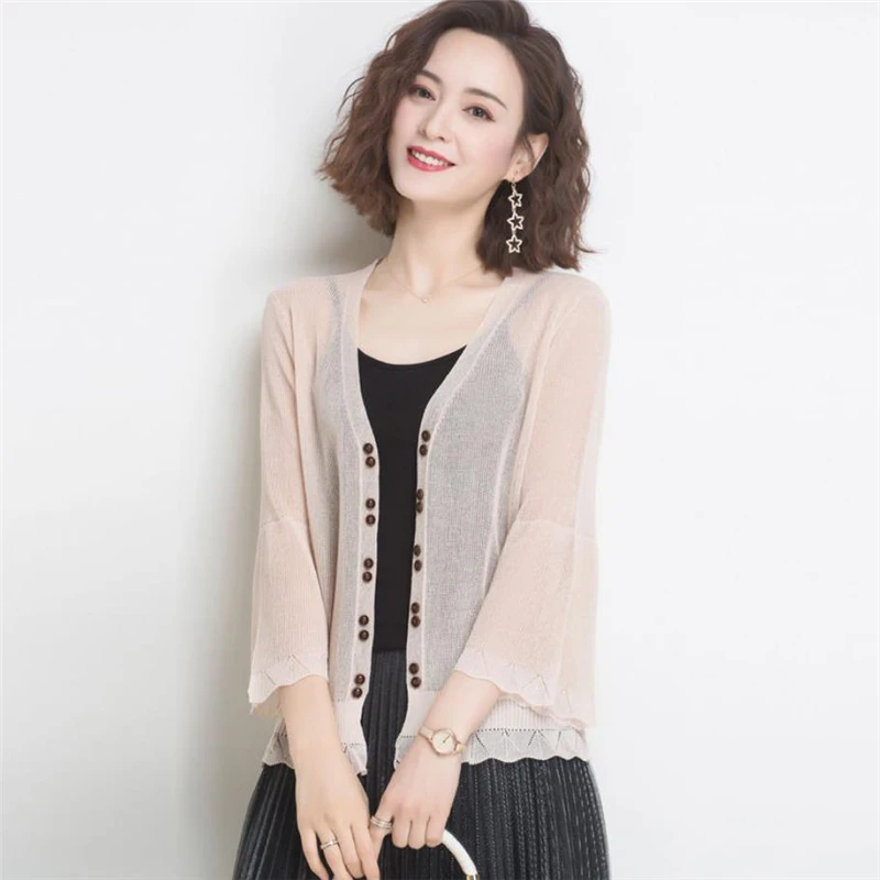 Hollow Out V-Neck Ninth Flare Sleeve Summer Knitted Sunscreen Cardigan Women Thin Small Coat Open Stitch Elegant Knitwear Tops
Hollow Out V-Neck Ninth Flare Sleeve Summer Knitted Sunscreen Cardigan Women Thin Small Coat Open Stitch Elegant Knitwear Tops
