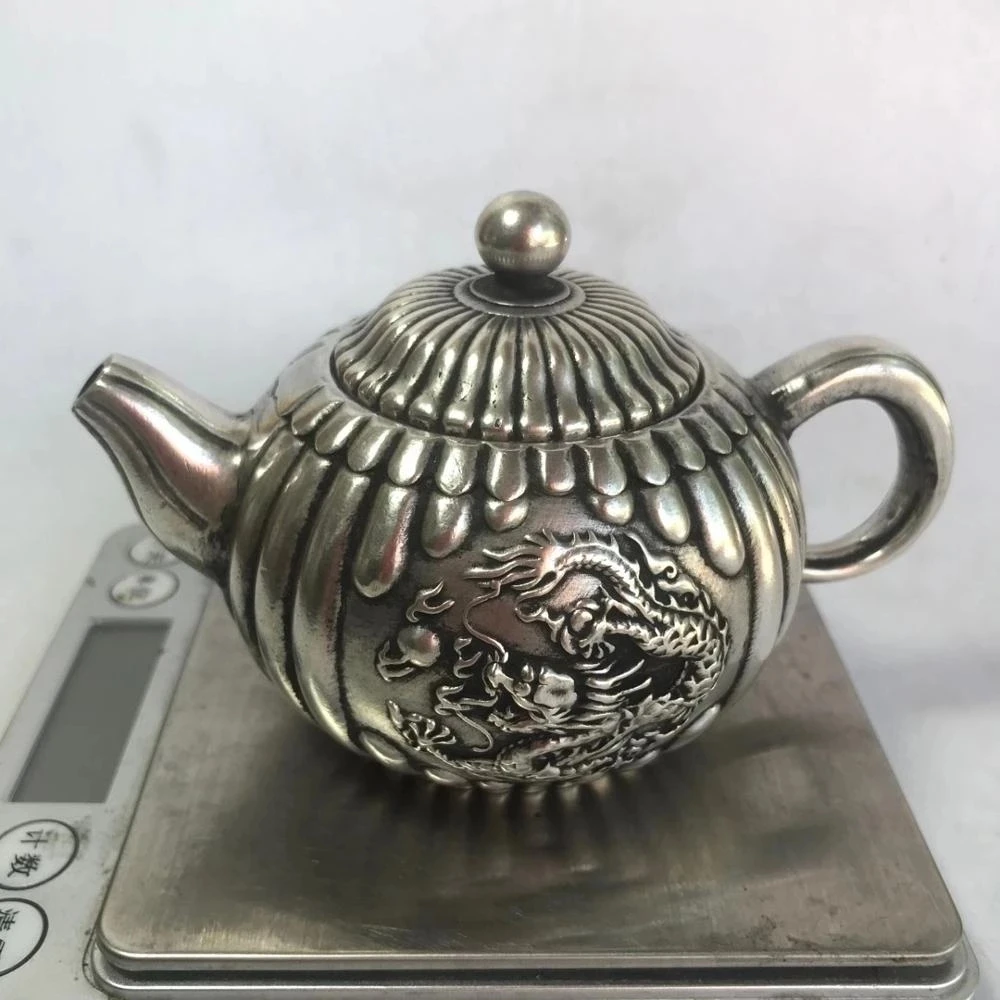 Коллекционный Декор Miao, резной серебряный дракон, декоративный чайник ручной работы, украшение для дома, металлические поделки, чайник
Коллекционный Декор Miao, резной серебряный дракон, декоративный чайник ручной работы, украшение для дома, металлические поделки, чайник