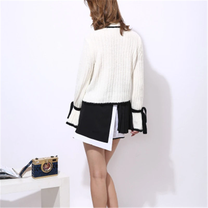 2020 New Autumn And Winter Sweater Female Fashion Round neck Bow Striped Trumpet sleeve Commute Knitting Women Tops High Quality 
2020 New Autumn And Winter Sweater Female Fashion Round neck Bow Striped Trumpet sleeve Commute Knitting Women Tops High Quality