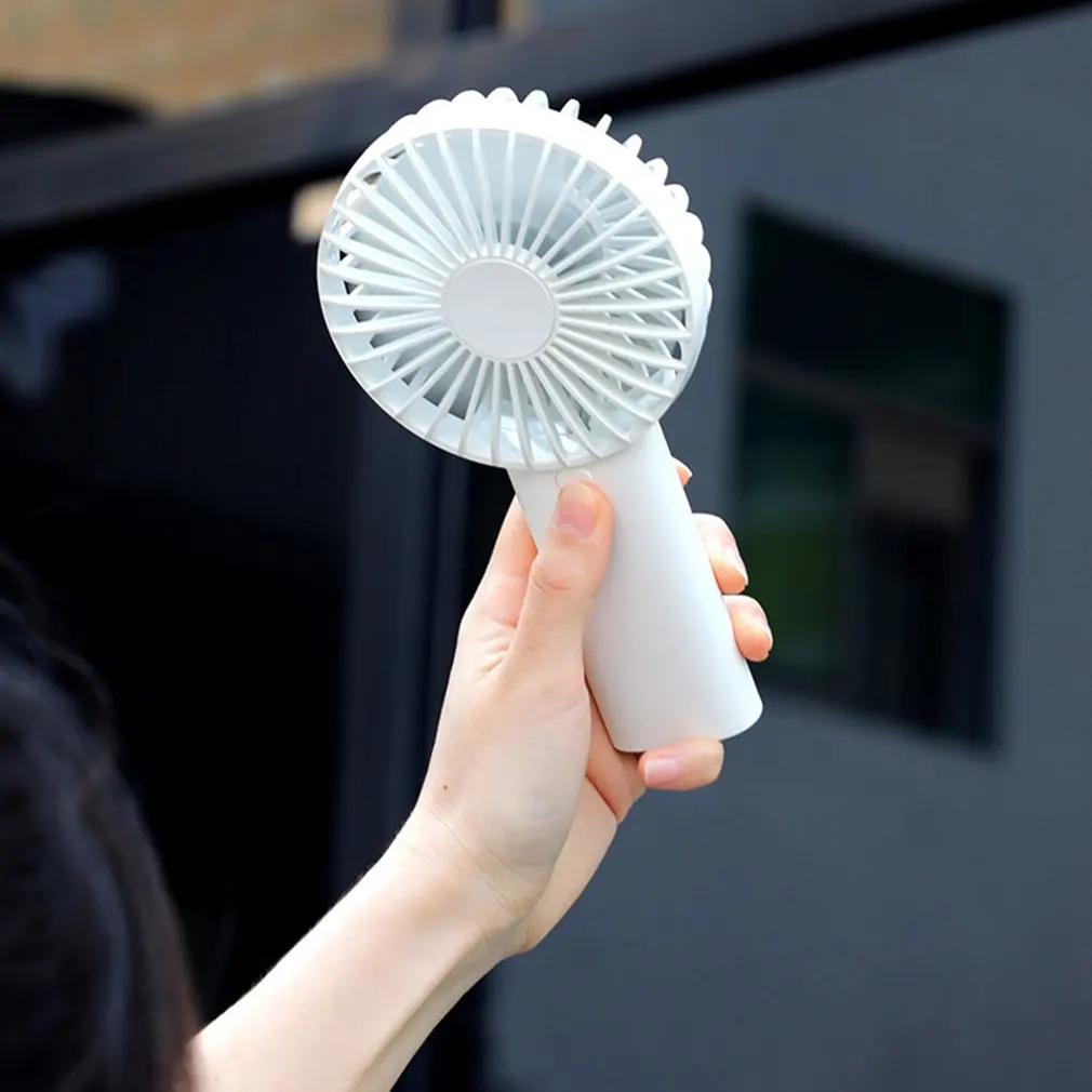 USB Charging Handheld Summer Mini Round Fan Electric Handheld Fan Nordic Outdoor Portable Cooler Student Fan 
USB Charging Handheld Summer Mini Round Fan Electric Handheld Fan Nordic Outdoor Portable Cooler Student Fan