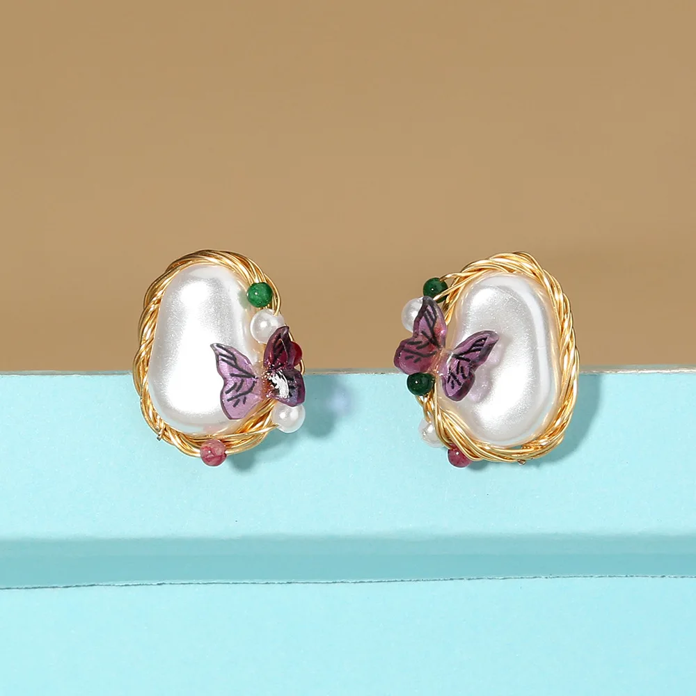 Fashion Women Hand-wound Exquisite Earrings Pearl Butterfly Creative Stud Earrings
Fashion Women Hand-wound Exquisite Earrings Pearl Butterfly Creative Stud Earrings