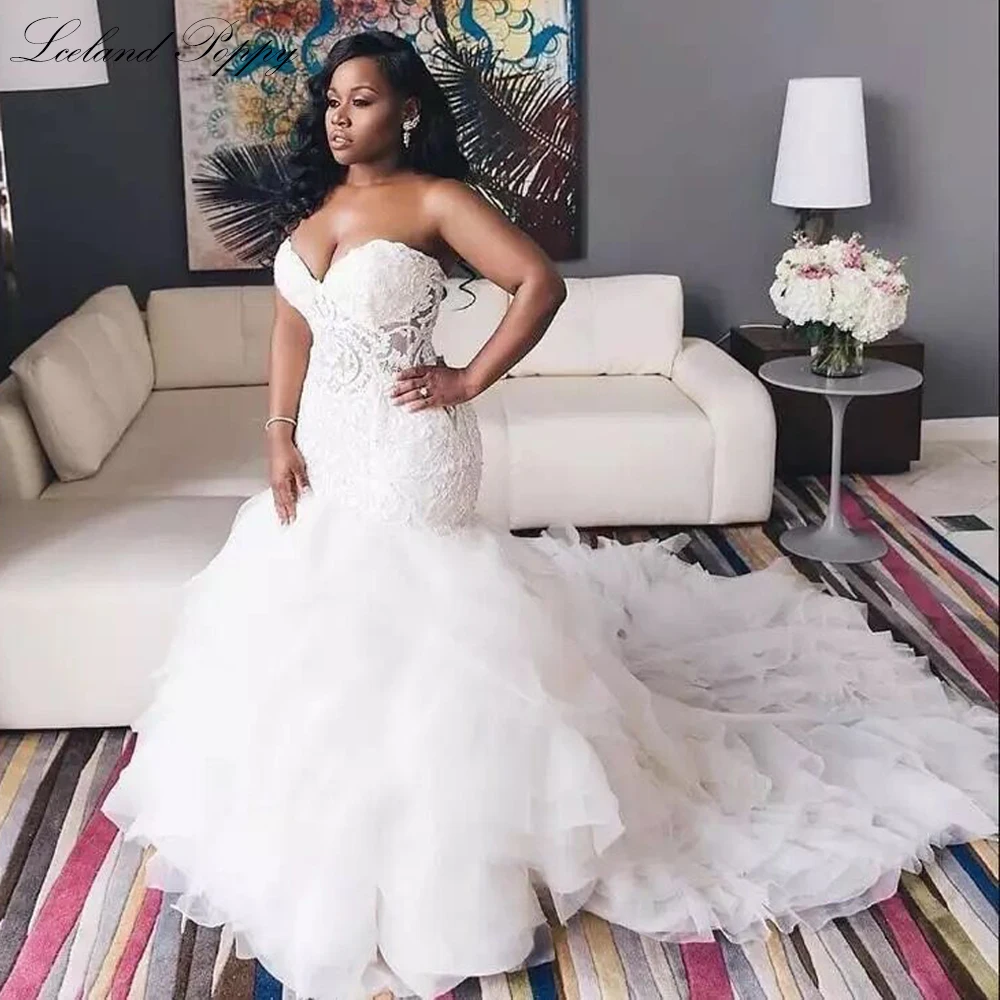 Lceland Poppy Women Strapless Mermaid Wedding Dresses Sleeveless Floor Length Beaded Lace Appliques Tiered Bridal Gowns
Lceland Poppy Women Strapless Mermaid Wedding Dresses Sleeveless Floor Length Beaded Lace Appliques Tiered Bridal Gowns
