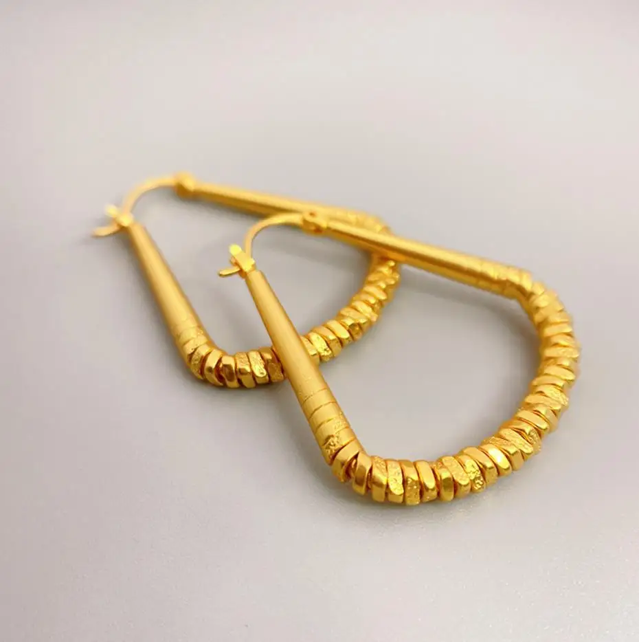 Europe ins new personality golden earrings for women retro bump texture fashion golden Triangle geometry metal cool girl eardrop
Europe ins new personality golden earrings for women retro bump texture fashion golden Triangle geometry metal cool girl eardrop
