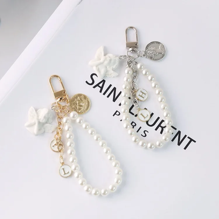 Creative Vintage White Angel Ancient COINS Keychain Women Girl Cute Mini Pearl Heart Key Chain Car Trinket Bag Charms Jewelry
Creative Vintage White Angel Ancient COINS Keychain Women Girl Cute Mini Pearl Heart Key Chain Car Trinket Bag Charms Jewelry