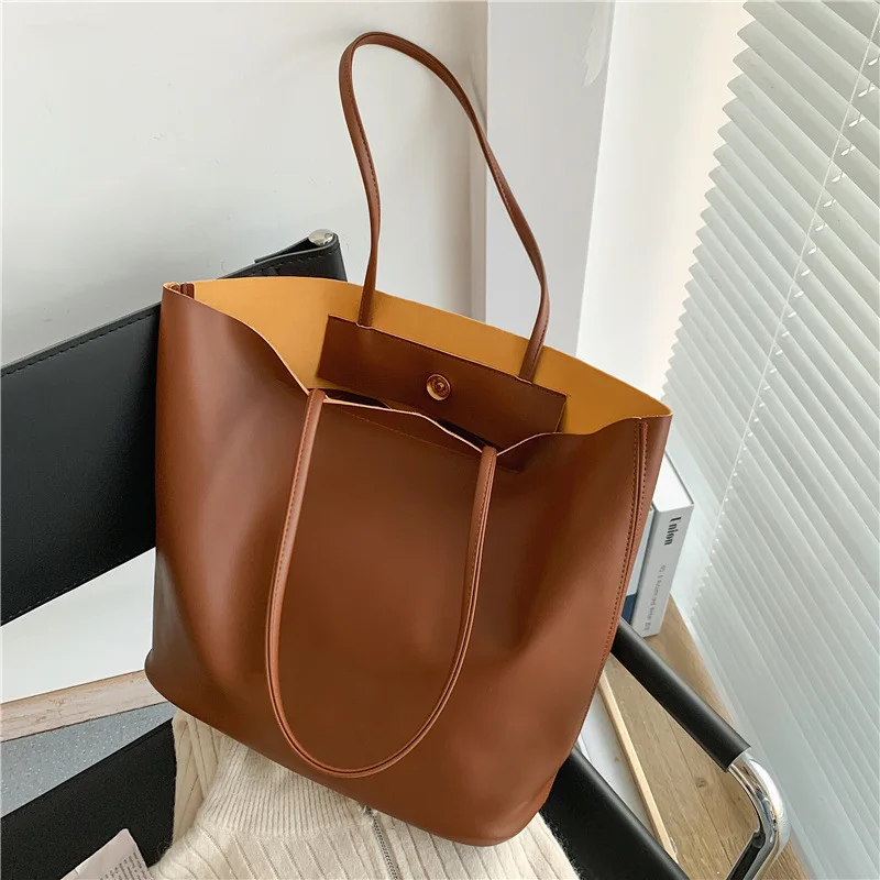 Simple Large-capacity Handbags Retro Ladies One-shoulder Underarm Bag 2020 Autumn and Winter New Fashion High-quality Tote Bag
Simple Large-capacity Handbags Retro Ladies One-shoulder Underarm Bag 2020 Autumn and Winter New Fashion High-quality Tote Bag