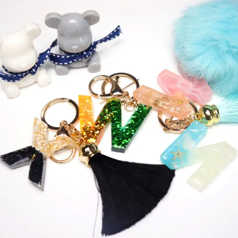 26 Pcs/set Crystal Epoxy English Letters Alphabet Silicone Molds For Resin DIY Hand made Jewelry Tools Pendant Model UV Mold 
26 Pcs/set Crystal Epoxy English Letters Alphabet Silicone Molds For Resin DIY Hand made Jewelry Tools Pendant Model UV Mold