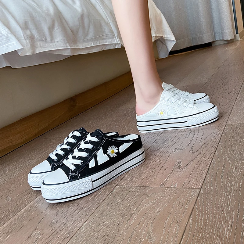 2021 summer thick bottom small daisy canvas shoes women's leisure half tray inner heightening muffin shoes women's fashion
2021 summer thick bottom small daisy canvas shoes women's leisure half tray inner heightening muffin shoes women's fashion