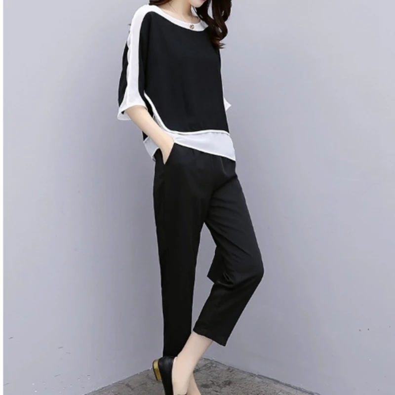 Plus Size L-5XL New Summer Patchwork Chiffon Loose Shirt And Elastic Waist Calf- Length Pants Set
Plus Size L-5XL New Summer Patchwork Chiffon Loose Shirt And Elastic Waist Calf- Length Pants Set