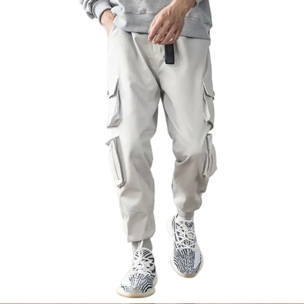 Men Casual Pants Multi Pockets Ankle Tied Drawstring Long Cargo Pants Loose Trousers Men's Clothing 2021
Men Casual Pants Multi Pockets Ankle Tied Drawstring Long Cargo Pants Loose Trousers Men's Clothing 2021