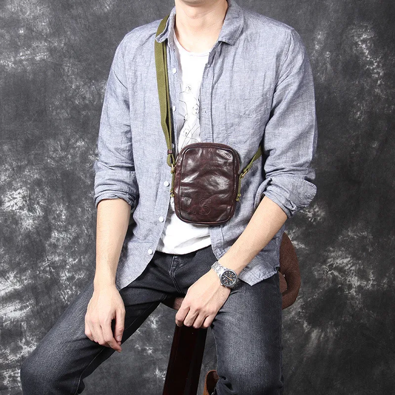 Retro casual men's genuine leather shoulder messenger bag first layer cowhide mini backpack chest bag mobile phone bag packet
Retro casual men's genuine leather shoulder messenger bag first layer cowhide mini backpack chest bag mobile phone bag packet