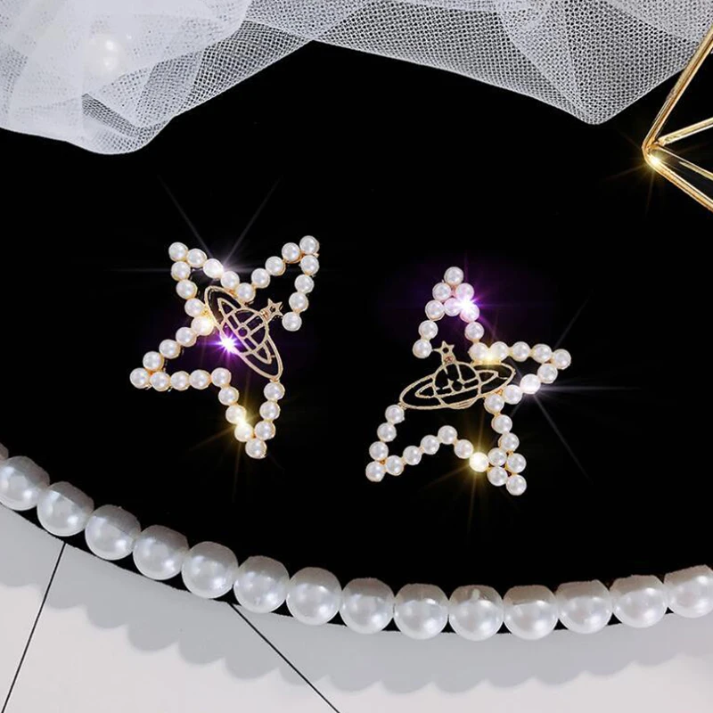 Japanese Korean jewelry sweet inlaid pearl hollow star stud earrings Fashion Pearl Charm Statement Jewelry Wedding Earrings Fema
Japanese Korean jewelry sweet inlaid pearl hollow star stud earrings Fashion Pearl Charm Statement Jewelry Wedding Earrings Fema