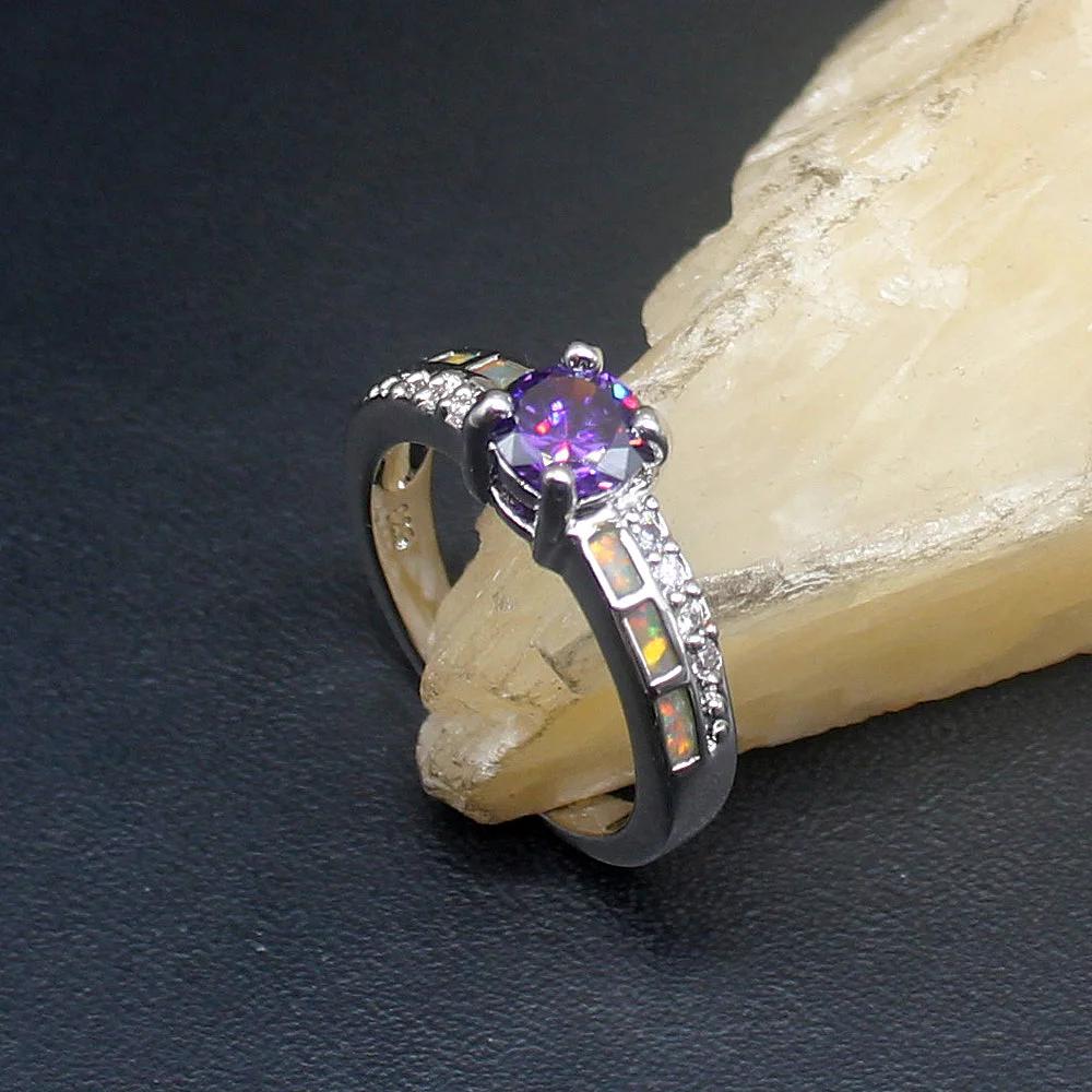 Женское кольцо из серебра 925 пробы с фиолетовым аметистом и белым опалом
Женское кольцо из серебра 925 пробы с фиолетовым аметистом и белым опалом