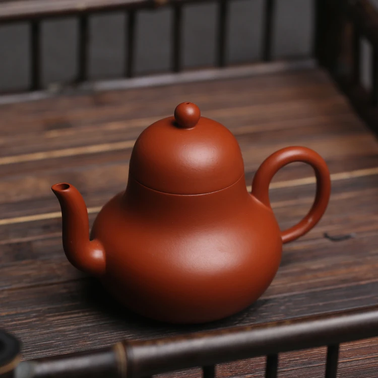 Чайник Gongfu Чайный из сиреневого песка, Классический маленький чайник без воды из исинской глины Цин, цементный чайник в форме груши
Чайник Gongfu Чайный из сиреневого песка, Классический маленький чайник без воды из исинской глины Цин, цементный чайник в форме груши
