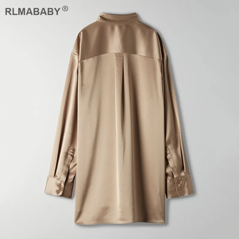 2021 Spring Summer Women Satin Blouse Shirts Loose Turn-Down Collar Long Sleeve Office Lady Top Sexy Casual Street White Blouse 
2021 Spring Summer Women Satin Blouse Shirts Loose Turn-Down Collar Long Sleeve Office Lady Top Sexy Casual Street White Blouse