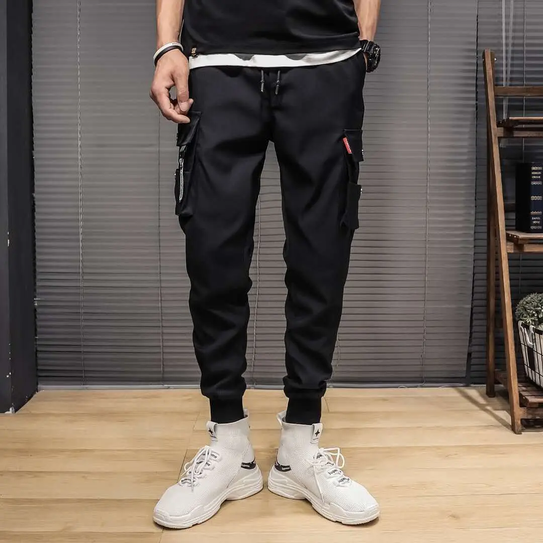 2021 pants male Korean version trend wild autumn new national tide nine-point sports pants loose feet tide brand overalls men
2021 pants male Korean version trend wild autumn new national tide nine-point sports pants loose feet tide brand overalls men