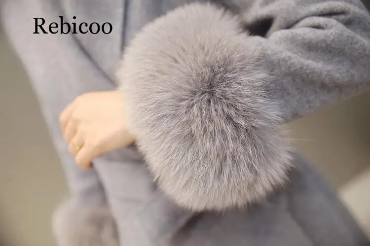 2019 new winter Korean version of the thin fox fur long woolen coat female wool woolen coat 
2019 new winter Korean version of the thin fox fur long woolen coat female wool woolen coat