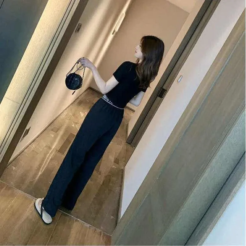 Summer Casual 2 Piece Set Women T-Shirt Top + Harlan Pants Fashion White Black Trend Tracksuit Women Student Two Piece Outfits
Summer Casual 2 Piece Set Women T-Shirt Top + Harlan Pants Fashion White Black Trend Tracksuit Women Student Two Piece Outfits