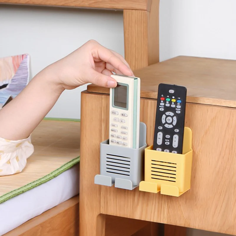 Remote Control Storage Box Wall Mounted Mobile Phone Plug Holder Stand Rack The position is stable, durable and small
Remote Control Storage Box Wall Mounted Mobile Phone Plug Holder Stand Rack The position is stable, durable and small