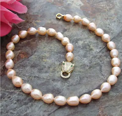 new AAA+9-10mm natural akoya south seas baroque gold pink pearl necklace 18 inch 
new AAA+9-10mm natural akoya south seas baroque gold pink pearl necklace 18 inch