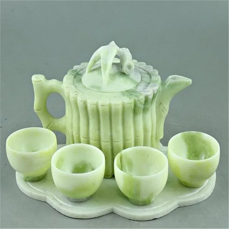 Natural Lantian jade tea set, wine set, jade ornament, one pot, four cups and one chassis
Natural Lantian jade tea set, wine set, jade ornament, one pot, four cups and one chassis