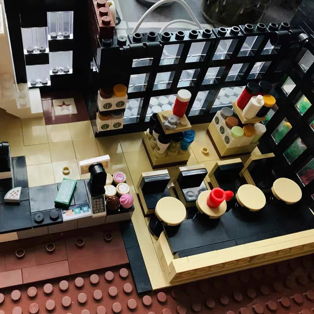 Creator Expert Street view Modern Cafe Corner Model Ideas Building Blocks 2926Pcs Moc Modular Bricks Pet Book Coffee Shop
Creator Expert Street view Modern Cafe Corner Model Ideas Building Blocks 2926Pcs Moc Modular Bricks Pet Book Coffee Shop