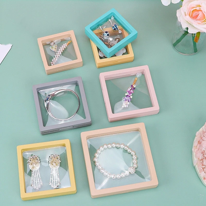11*11cm Transparent Jewelry Suspended Floating Display Case Holder PET Ring Earrings Pendant Gem Stones Jewelry Display Stand
11*11cm Transparent Jewelry Suspended Floating Display Case Holder PET Ring Earrings Pendant Gem Stones Jewelry Display Stand