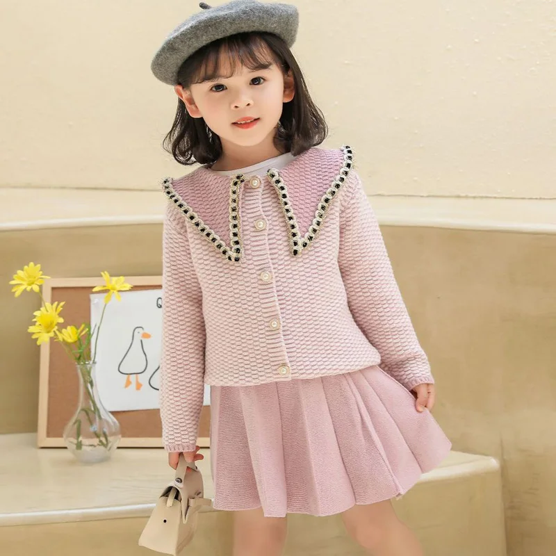 Girls' Clothes Sets 2021 New Spring Autumn Long Sleeve Lapel Collar Knitted Sweater Top + Soild Skirt Cute Kids Clothes Outfit
Girls' Clothes Sets 2021 New Spring Autumn Long Sleeve Lapel Collar Knitted Sweater Top + Soild Skirt Cute Kids Clothes Outfit