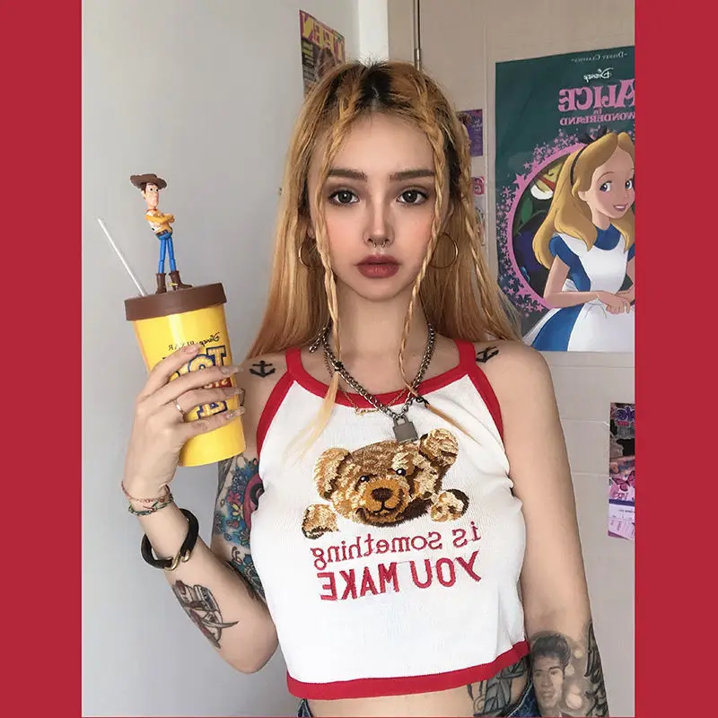 Bear condole belt female design feeling niche wearing net red sleeveless vest early spring slim short bottoming top 
Bear condole belt female design feeling niche wearing net red sleeveless vest early spring slim short bottoming top