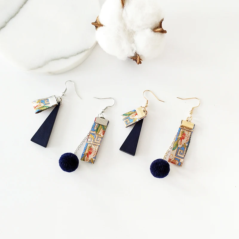 Qingdao Aila jewelry retro national style embroidery Ribbon Ribbon wooden asymmetric earrings earrings
Qingdao Aila jewelry retro national style embroidery Ribbon Ribbon wooden asymmetric earrings earrings
