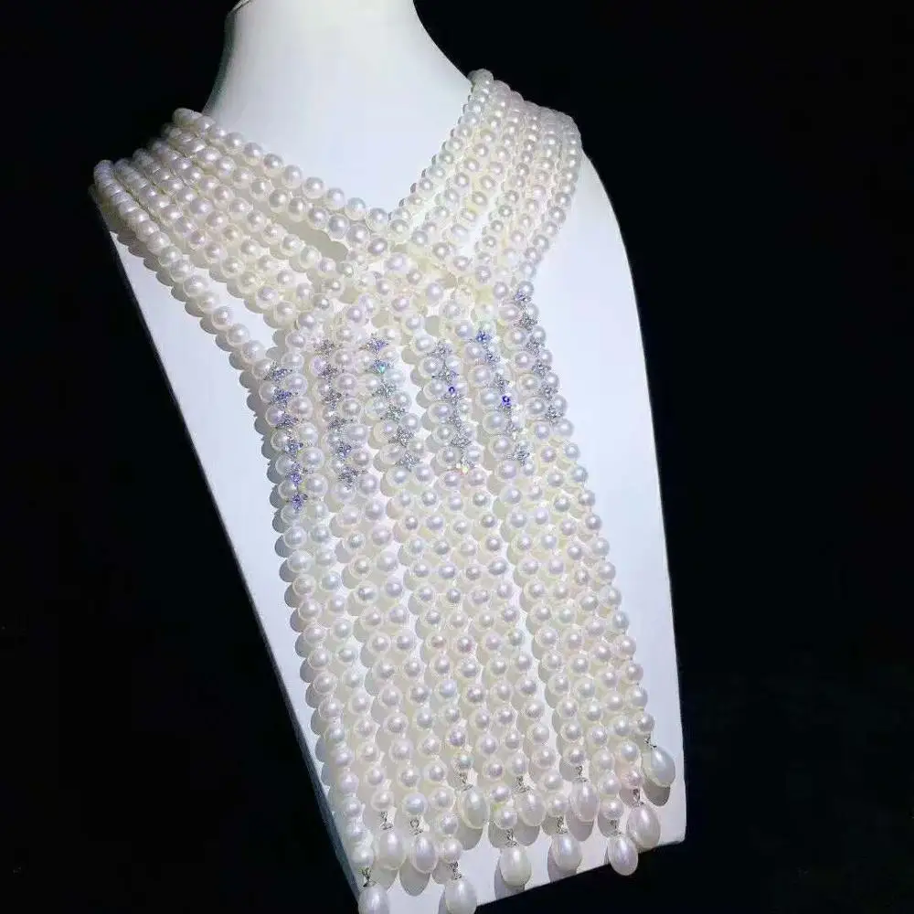 Ожерелье ручной работы из белого пресноводного жемчуга 8-9 мм с инкрустацией из микро циркония длиной 120 см
Ожерелье ручной работы из белого пресноводного жемчуга 8-9 мм с инкрустацией из микро циркония длиной 120 см